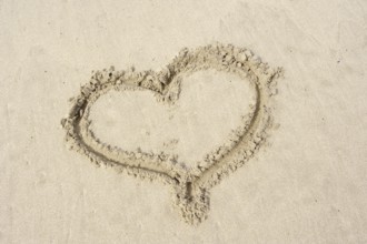 Heart painted in the sand on the beach, Camargue, Provence, South of France