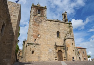 Historic church with ornate bell towers under a blue sky, Iglesia de San Mateo, Old Town,