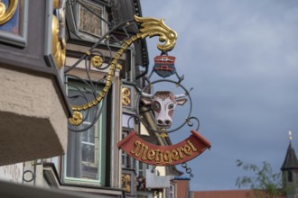 Nose sign with a cow's head of a butcher's shop, Rottwei, Baden-Württemberg, Germany, Europe