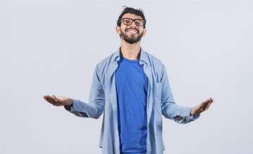 Generous man with open arms isolated. Man sharing open hands looking at the camera with a friendly