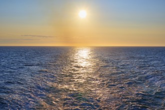 View from the cruise ship at sunrise at the stern of the ship to the stern waves, View from the