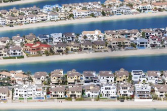 Artificial island in the shape of a palm tree The Palm Jumeirah with luxury villas properties in