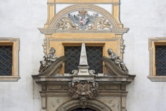 Detailed view of the entrance portal with the Alegories of Faith and Peace of the Baroque Town Hall