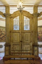 Baroque wooden portal inside a historic church in the city of Ouro Preto in Minas Gerais, Ouro