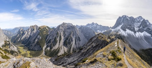 Panorama, view into Falzthurntal, mountaineer on a hiking trail on the ridge of Hahnkampl, mountain