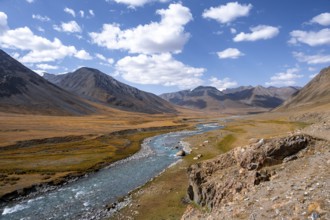 Burkhan valley with blue river, mountain landscape with golden meadows, Terskey Ala-Too, Tien Shan,