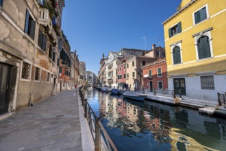 Colourful house facades reflected in the canal, Venice, Veneto, Germany, Europe