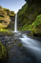 Kvernufoss waterfall, in summer when the weather is fine, gorge and river, long exposure, Skogar,