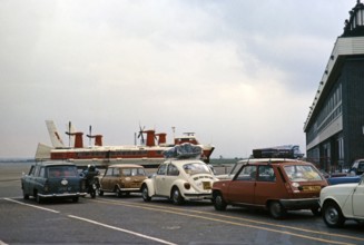 Cars waiting on the quayside for a Hoverlloyd hovercraft to cross the Channel, Ramsgate, Kent,