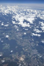 View from an altitude of 11887 metres 39000 feet to white clouds cirrocumulus in the background