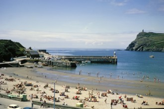 Sandy beach and harbour pier in Port Erin, Isle of Man, British Crown Colony, around 1965, Europe