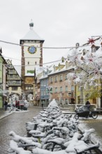 Houses covered with snow in the historic city centre, Freiburg im Breisgau, Black Forest,