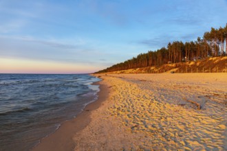 Beach at sunset, close to Stegna, a village in Nowy Dwór Gdanski County, Pomeranian Voivodeship, in