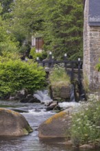 Buildings located at a waterway in Pont-Aven. The village is known for the artists who worked there