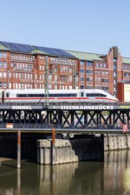 ICE 4 high-speed train of Deutsche Bahn DB on the Oberhafen Bridge in Hamburg, Germany, Europe