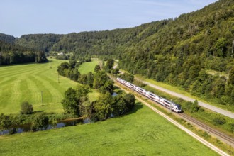 IC2 train of Deutsche Bahn DB type Stadler KISS on the Gäubahn aerial view in Sulz, Germany, Europe