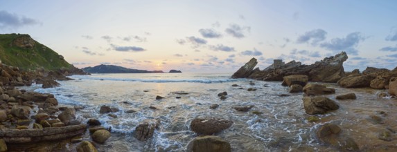 Sunset at the Atlantic coast in summer on the way to Zarautz at the Camino del Norte, coastal path,