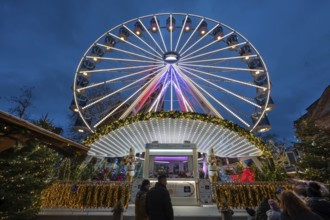 Ferris wheel at the winter village, Christmas market at dusk, Jakobsplatz, Nuremberg, Middle