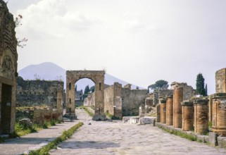 Roman ruins Archaeological Park of Pompeii, Naples, Italy, Europe 1967 with Mount Vesuvius volcano