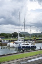 Private boats in lock, Miraflores locks, Panama Canal, Panama City, Panama, Central America