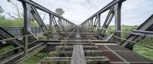 Abandoned railway bridge over the Elbe near Barby, lost place, steel truss bridge from the 1870s on