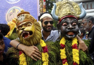 Traditional Kummatti dancers wear colourful wooden masks gods Kummatti Mahotsavam celebrate Onam