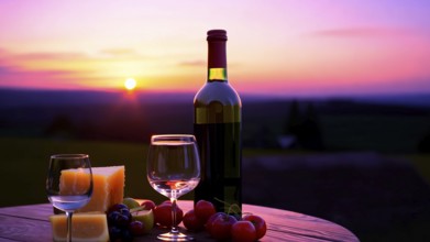 Glass of wine standing on a wooden table outdoors with cheese and fruits at sunset, AI generated