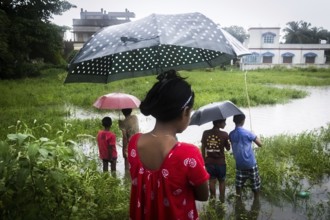 Children standing, monsoon, Barasat, Kolkata, West Bengal, India, Asia