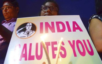 People pay candle light tribute to slain Indian soldiers at Gateway of India, in Mumbai, India on