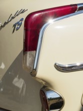 Close-up of the rear light of a classic car with chrome details, Bocholt, Münsterland, Germany,