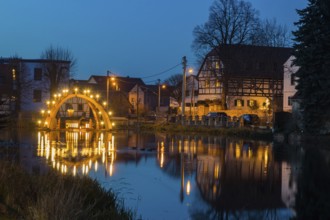 Floating candle arch in the village pond of Bärnsdorf near Moritzburg. The arch is 4.5m high,