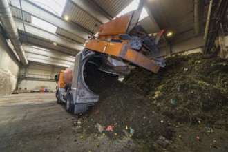 A disposal vehicle from the company Becker Umwelttechnik, delivers the contents of organic waste