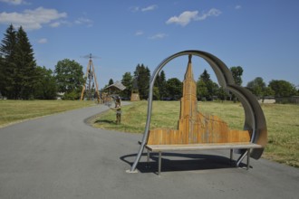 Bench with church at the Exulantenweg, figure, wooden sculpture, footpath, Johanngeorgenstadt,