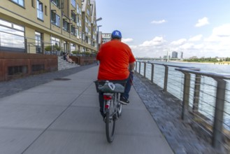 Cycling from the first-person perspective on a shared footpath and cycle path in Cologne, North