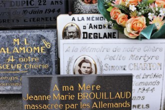 Graves of the murdered inhabitants in the cemetery. The burnt village of Oradour-sur-Glane was