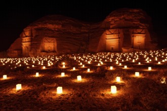 Illuminated Nabataean tombs at night, Hegra or Mada'in Salih, AlUla region, Medina province, Saudi