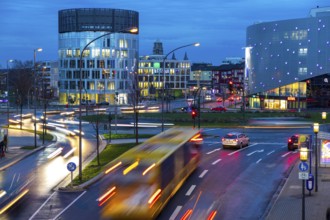 Evening city centre traffic in Essen, large intersection, roundabout, Berliner Platz, this area