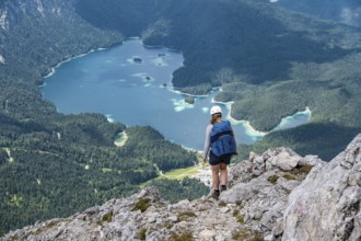 Mountaineer at Waxenstein, Eibsee lake, Wetterstein Mountains, Garmisch-Patenkirchen, Bavaria,