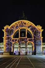 Archway on the station square, light installation at dusk, Lilu, Light Festival 2023, Lucerne,