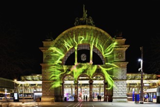 Archway on the station square, light installation at dusk, Lilu, Light Festival 2023, Lucerne,