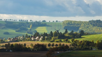 Autumnal field landscape near Possendorf with windmill in the Eastern Ore Mountains