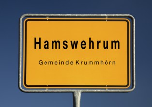 Place name sign for Hamswehrum, a village in the municipality of Krummhörn in the district of