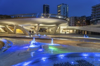 Modern architecture and colourfully lit fountains of Eleftheria Square at dusk, Nicosia, Cyprus,