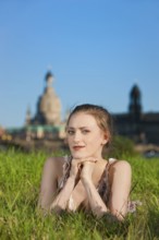 Young woman on the Elbe meadows in Dresden