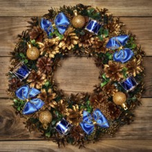 Christmas wreath on wooden background