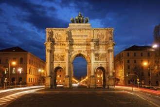 Siegestor (Victory Gate) in the evening. Motion blur because of long exposure. Munich, Bavaria,