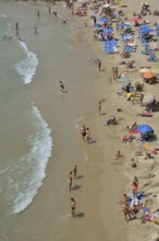 Bathers on Playa Poniente, Benidorm, Costa Blanca, Spain beach