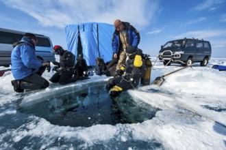 Scuba divers, Lake Baikal, Olkhon Island, Pribaikalsky National Park, Irkutsk Province, Siberia,