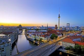 City panorama with Spree, Cathedral, Nikolai Quarter, Red City Hall and TV Tower in the evening,