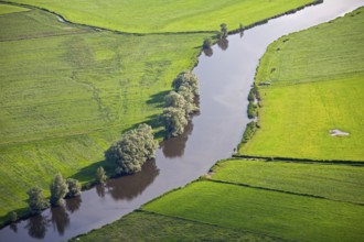 Aerial view over farmland and river bend of the Eider near Rendsburg, Schleswig-Holstein, Germany,